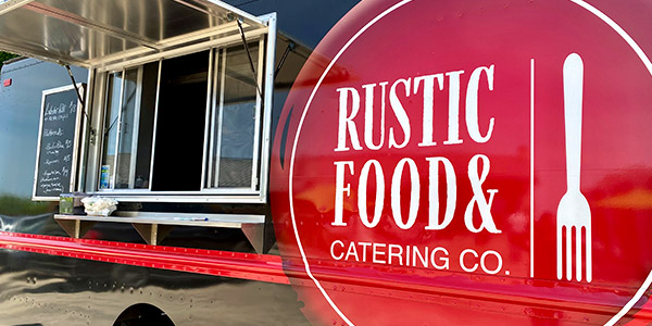 Rustic Food & Catering Food Truck window.